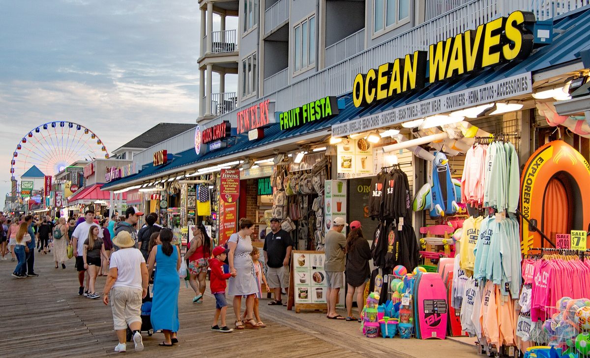 The Ocean City, Maryland boardwalk lined with shops and beachgoers.